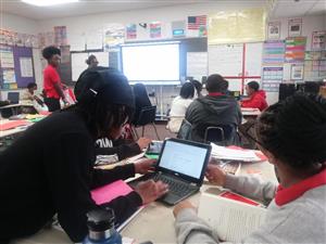 AJ working with 8th grade